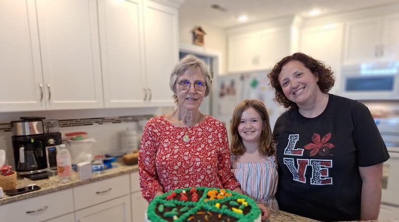 Preparing for the Ohio State Fair in a one-day baking marathon are
(left to right) Christine Olinsky, her granddaughter Anna and her daughter Rebecca.
CONTRIBUTED