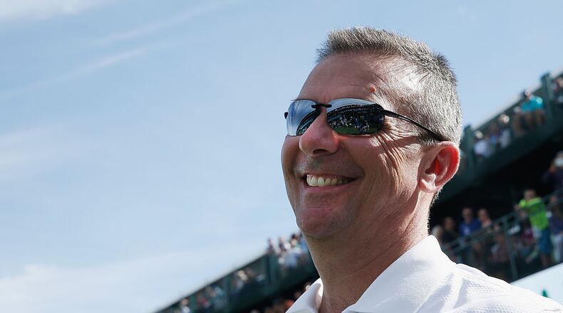SCOTTSDALE, AZ - JANUARY 28:  Urban Meyer, head football coach at  Ohio State University,  looks up to the gallery on the 16th hole during the pro-am prior to the start of the Waste Management Phoenix Open at TPC Scottsdale on January 28, 2015 in Scottsdale, Arizona.  (Photo by Scott Halleran/Getty Images)