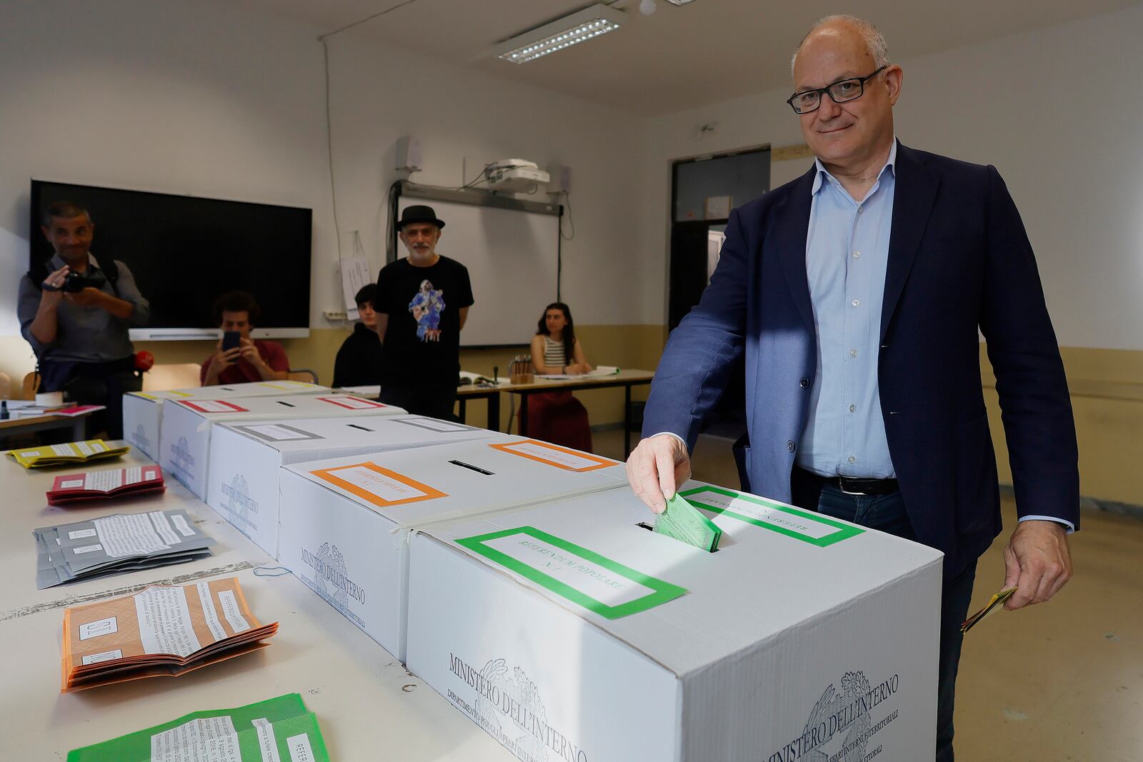 Rome Mayor Roberto Gualtieri casts his ballots on referendums on citizenship and job protections, at a polling station in Rome, Sunday, June 8, 2025. (Cecilia Fabiano/LaPresse via AP)