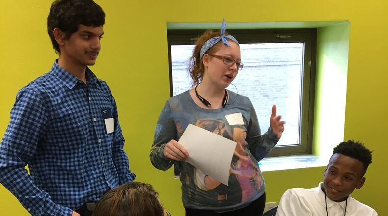 Wittenberg University students Ayush Jaiswal (left) and Grace Baker talk with Hayward Middle School students during the seventh Martin Luther King, Jr. Day of Community Service, organized by Wittenberg’s Community Service Program on Saturday. BRETT TURNER / CONTRIBUTED