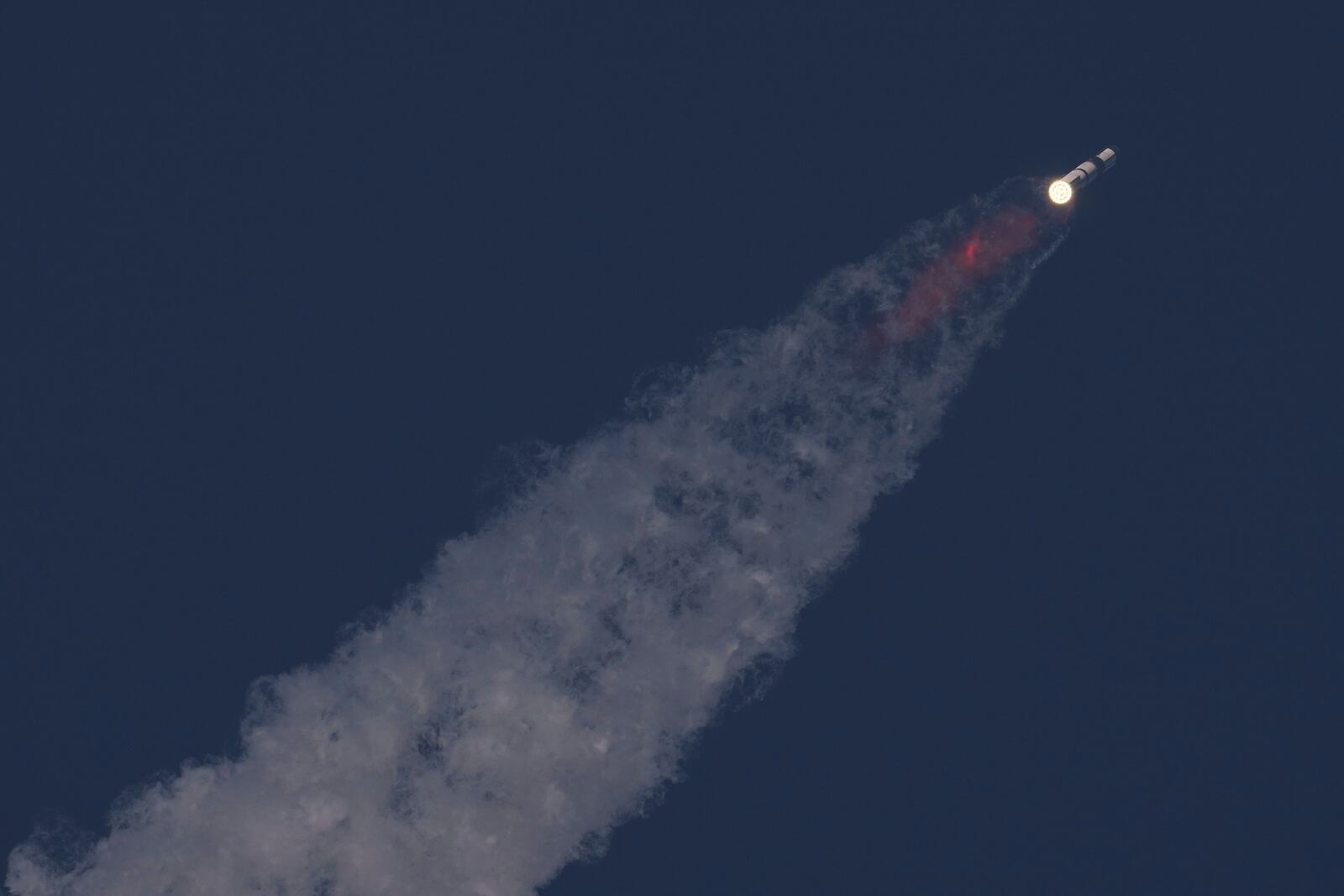 SpaceX's mega rocket Starship makes a test flight from Starbase, Texas, Tuesday, May 27, 2025. (AP Photo/Eric Gay)