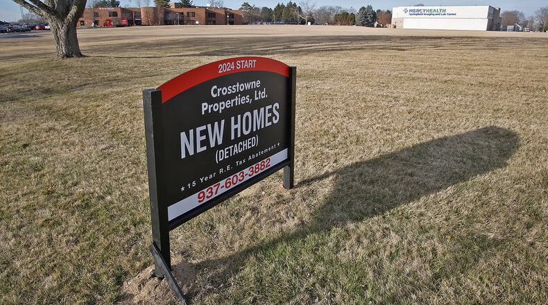 Crosstowne Properties, Ltd. is building 50 new homes at the site of the former Mercy Hospital on North Fountain Avenue and 100 at the site of the former Jefferson School. BILL LACKEY/STAFF