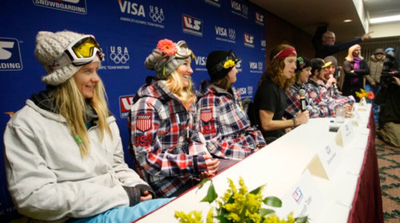 The new U.S. Olympic Snowboard Team from left; Hannah Teter, Gretchen Bleiler, Kelly Clark, Shaun White, Louie Vito, Scott Lago and coach Mike Jankowski take part in a news conference after they were announced at the U.S. Snowboarding Grand Prix finals, Saturday, Jan. 23, 2010, in Park City, Utah.