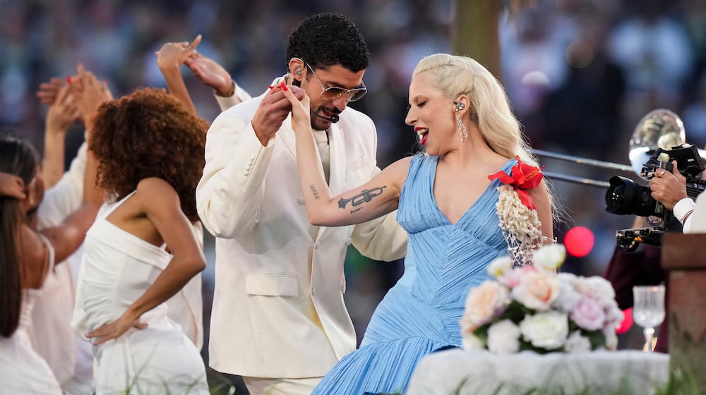 Bad Bunny and Lady Gaga perform during halftime of the NFL Super Bowl 60 football game between the New England Patriots and the Seattle Seahawks, Sunday, Feb. 8, 2026, in Santa Clara, Calif. (AP Photo/Lynne Sladky)