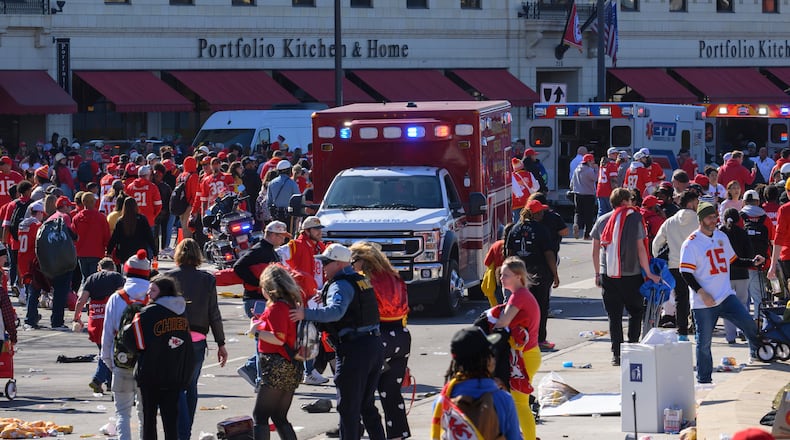 FILE - Police clear the area following a shooting at the Kansas City Chiefs NFL football Super Bowl celebration, in Kansas City, Mo., Feb. 14, 2024. (AP Photo/Reed Hoffmann, File)