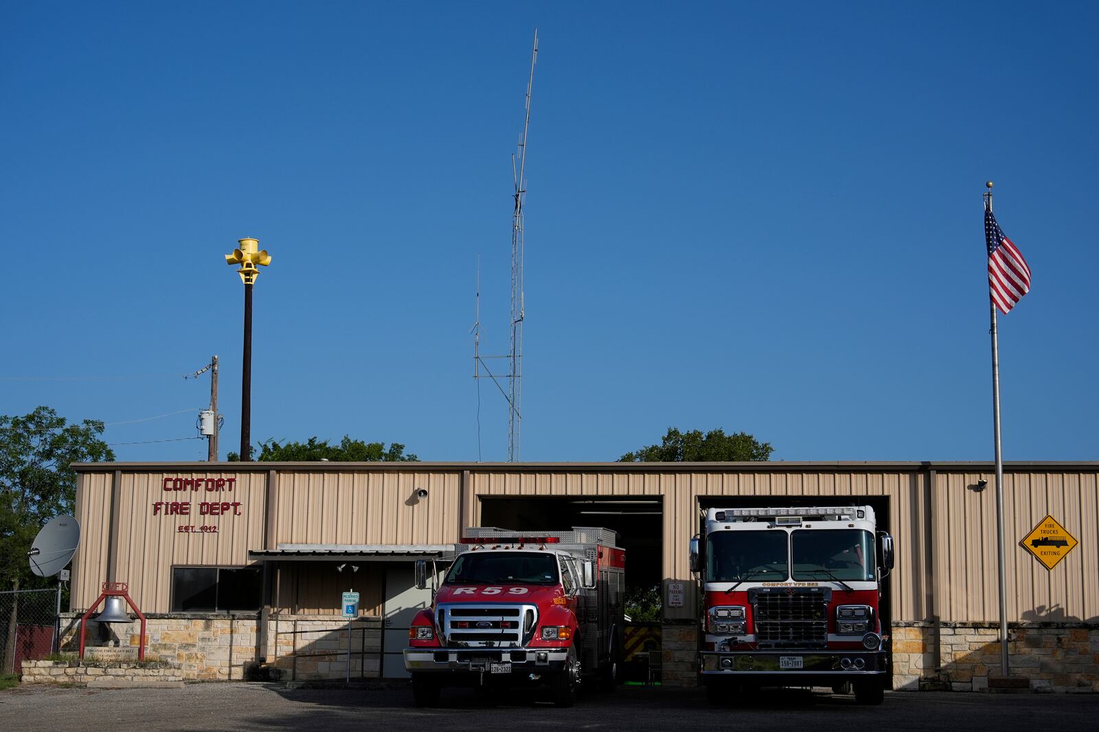 An emergency siren stands on top of the Comfort Volunteer Fire Department in Comfort, Texas, on Thursday, July 10, 2025. (AP Photo/Ashley Landis)