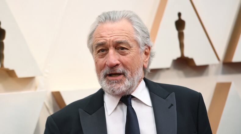 FILE - Robert De Niro appears at the Oscars in Los Angeles on Feb. 9, 2020. A leg injury may keep De Niro from celebrating the 20th Anniversary of the Tribeca Film Festival in person. The accident happened last week in Oklahoma while on location for the upcoming Martin Scorsese film, “Killers of the Flower Moon.” (Photo by Richard Shotwell/Invision/AP, File)