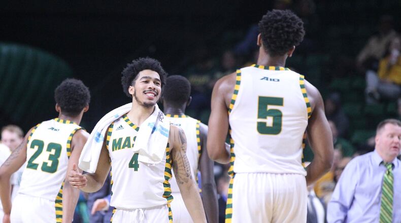 George Mason's Otis Livingston II (4) smiles during a game against Dayton on Wednesday, Feb. 14, 2018, at EagleBank Arena in Fairfax, Va.