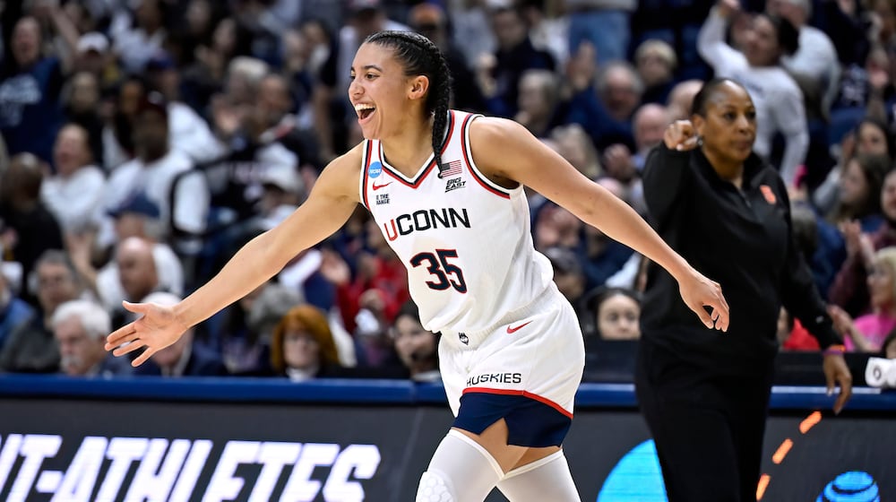 UConn guard Azzi Fudd (35) reacts after making a 3-point basket during the first half in the second round of the NCAA college basketball tournament against Syracuse, Monday, March 23, 2026, in Storrs, Conn. (AP Photo/Jessica Hill)