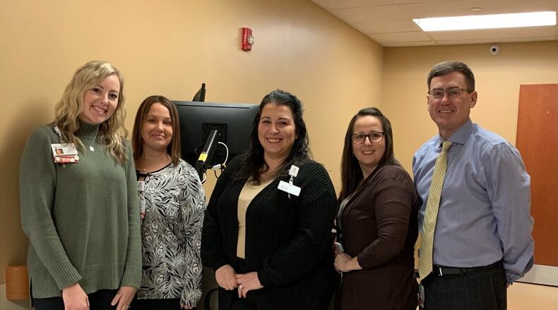 Ohio Valley Wound and Hyperbaric Center opened at 100 W. Main St. on the second floor. In this photo from left to right is: Liz Hannon, Executive Sponsor; Shelly Jenkins, Clinical Nurse Manager; Christine Davis, Patient Navigator; Desiree Sullivan, Program Director; and Dr. Steven Conkel, Medical Director of the Wound Center. Contributed