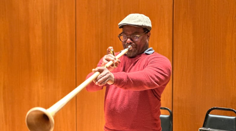 Metropolitan Opera Orchestra principal trumpet player Billy R. Hunter Jr. practices with a holztrompete, a wood horn specified by Richard Wagner for the third act of “Tristan und Isolde," at the Metropolitan Opera in New York on Feb. 28, 2026. (AP Photo/Ron Blum)