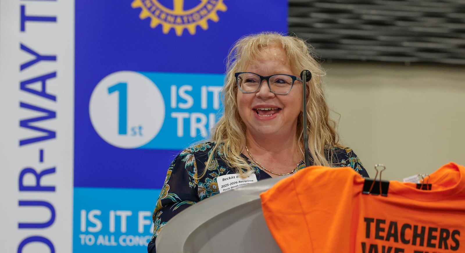 Beckitt Bostick, second grade teacher at Perrin Woods Elementary, speaks as she's honored with an Excellence in Teaching award at a luncheon at the Hollenbeck Bayley Center on Monday, March 23, 2026, in Springfield. JOSEPH COOKE/STAFF