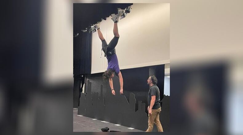 Youth Arts Ambassador Brady Castillo tests out the system that will help him fly in his role as Bert for the upcoming production of “Disney and Cameron Mackintosh’s Mary Poppins Jr.” at the John Legend Theater this weekend.