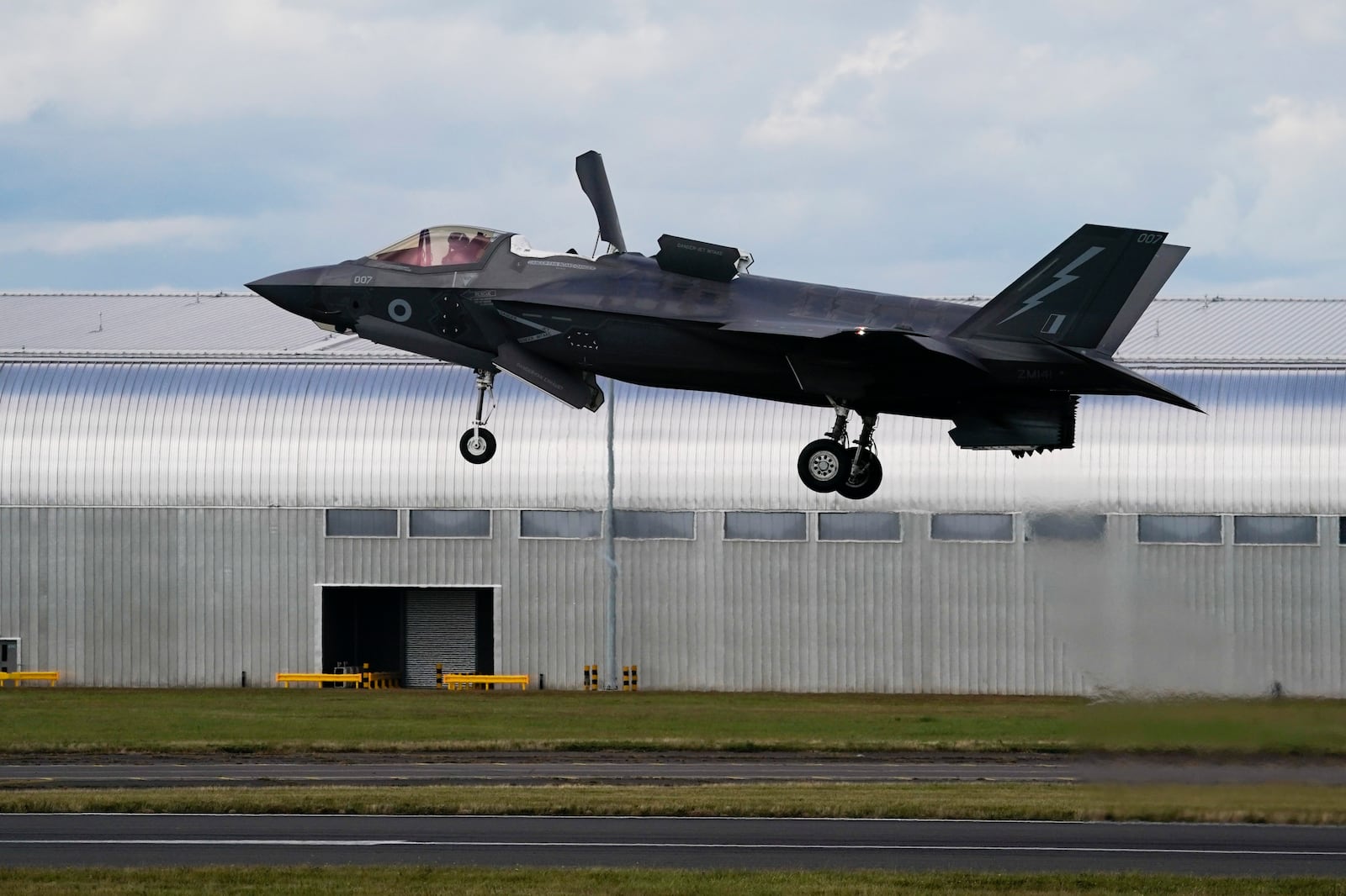FILE - A Royal Air Force F-35 lands at the Farnborough International Air Show in Farnborough, England, on July 22, 2024. (AP Photo/Alberto Pezzali, File)