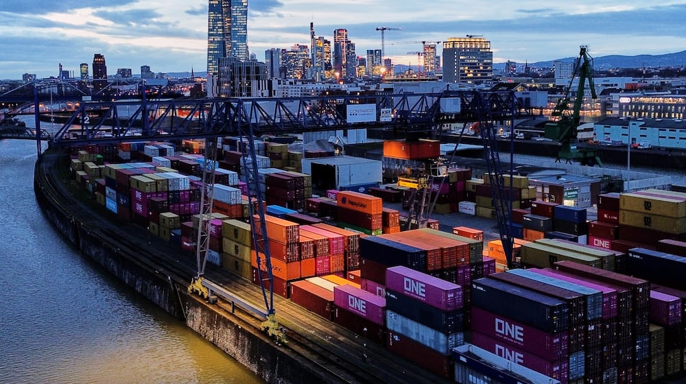 Containers are stored in a cargo terminal in Frankfurt, Germany, Monday, Feb. 23, 2026. (AP Photo/Michael Probst)