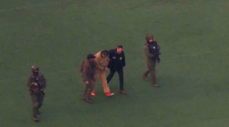 This image taken from video shows Venezuelan President Nicolas Maduro being escorted to board a helicopter for transport to Manhattan Federal Court, Monday, Jan. 5, 2026, in New York. (WABC via AP)