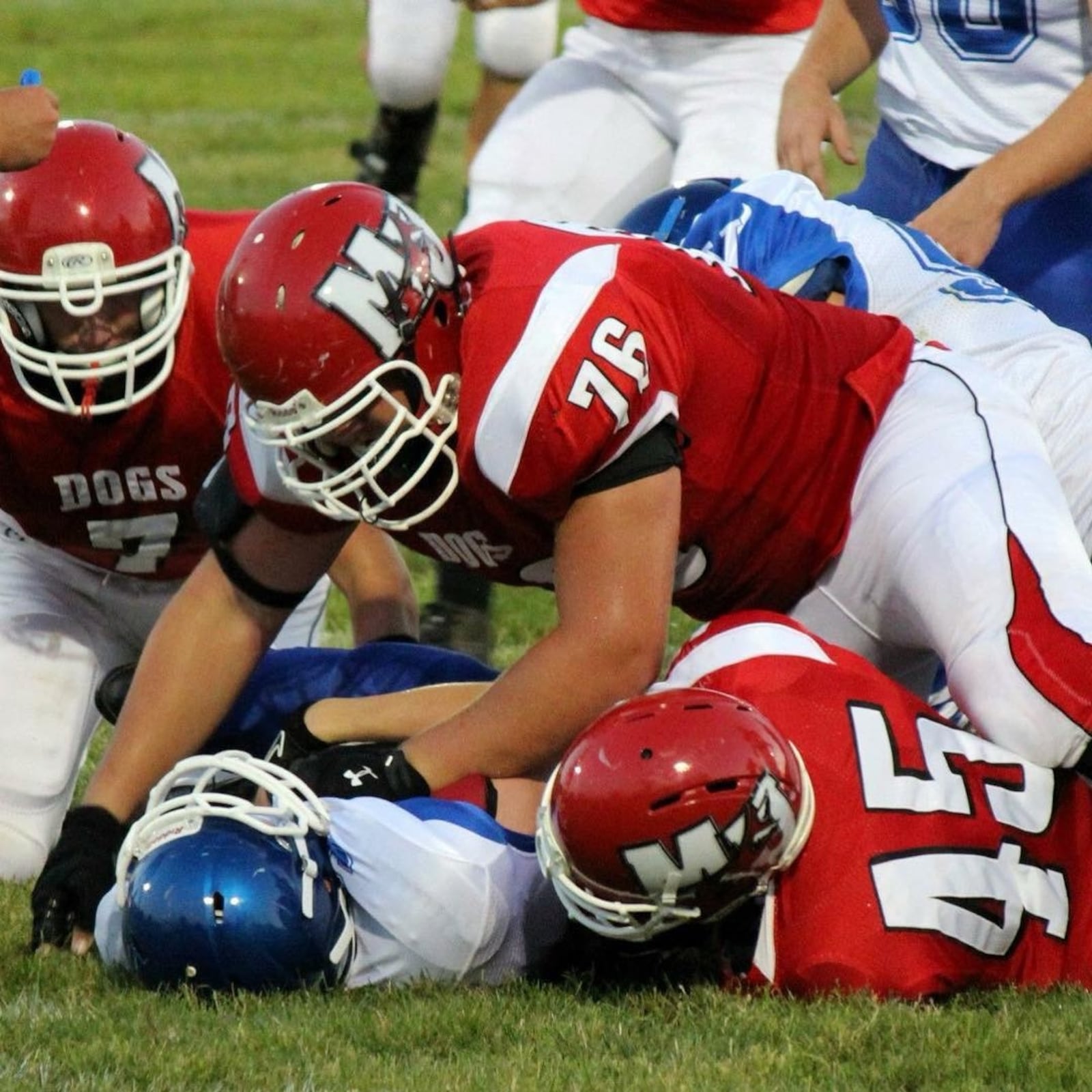 Milton Union High’s All-Ohio offensive lineman Wes Martin smothers a defender  with a pancake block in a high school game. CONTRIBUTED PHOTO