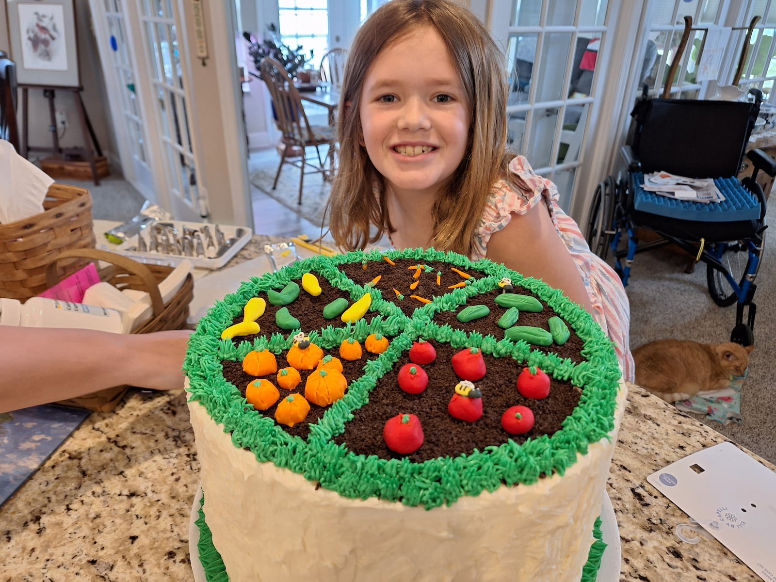 Anna Supinger decorated a cake as a garden for the Ohio State Fair. She loves baking with her mother and grandmother.
CONTRIBUTED
