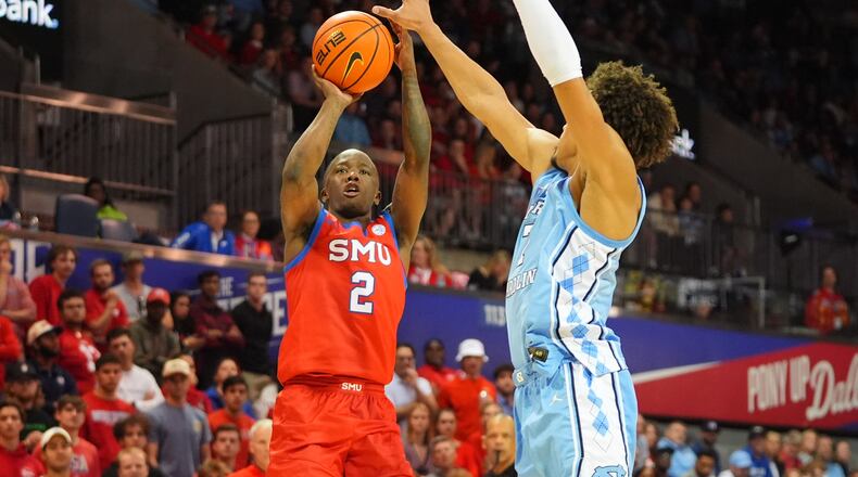 SMU guard Boopie Miller (2) shoots against North Carolina guard Seth Trimble (7) during the second half of an NCAA college basketball game Saturday, Jan. 3, 2026, in Dallas. (AP Photo/LM Otero)