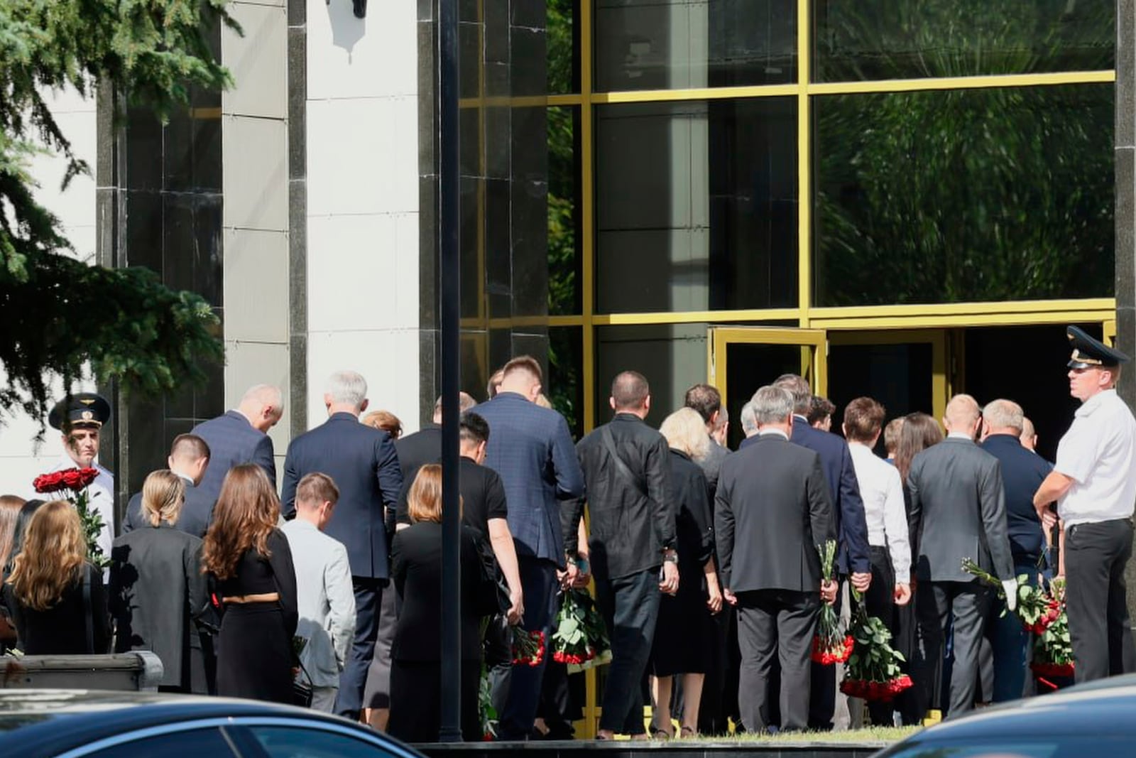 People line up to bid farewell to Roman Starovoit, the former transport minister who died in apparent suicide after his dismissal, at the morgue of the Central Clinical Hospital in Moscow, Russia, Thursday, July 10, 2025. (AP Photo)