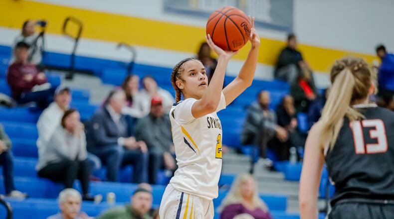 Springfield's Milly Portis takes a shot vs. Beavercreek in a Greater Western Ohio Conference girls basketball game on Monday, Jan. 29, 2024. Michael Cooper/CONTRIBUTED