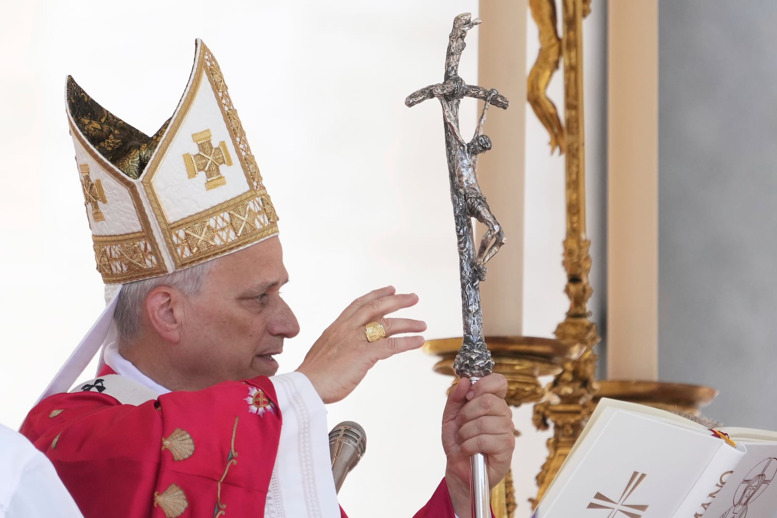 Pope Leo XIV delivers his blessing at the end of a Mass for the Jubilee of New Religious Associations on Pentecost Day in St. Peter's Square at the Vatican, Sunday, June 8, 2025. (AP Photo/Andrew Medichini)