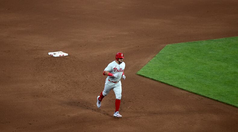 Kyle Schwarber, of the Phillies, rounds the bases after a home run against the Reds in the fifth inning on Thursday, April 13, 2023, at Great American Ball Park in Cincinnati. David Jablonski/Staff