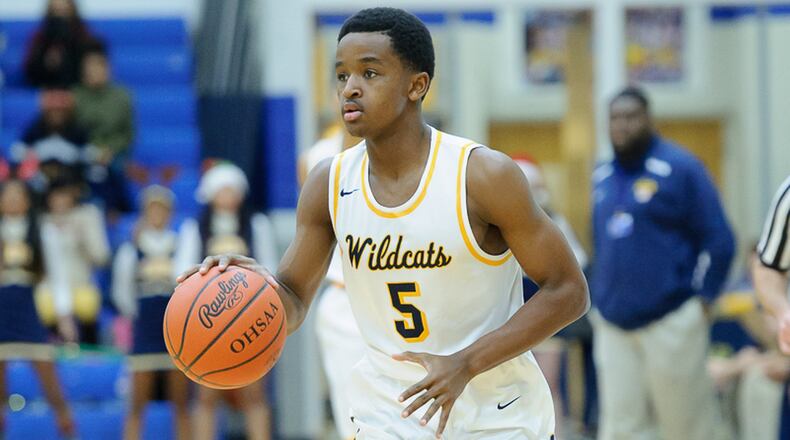 Springfield junior guard Michael Wallace dribbles during a game against Northmont on Dec. 23. Springfield earned the No. 1 seed in the Dayton Div. I sectional on Sunday. Contributed Photo by Bryant Billing