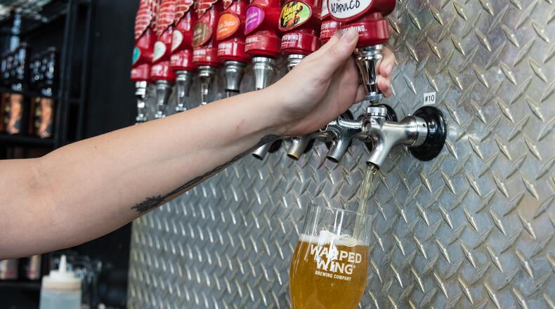 Warped Wing Brewing Company and The Pizza Bandit celebrated the launch of their Acapulco Gold Session IPA collaboration at the brewery’s downtown Dayton taproom on Thursday, April 20, 2023. Attendees also went on a bar crawl that featured stops at The Oregon Express, Blind Bob’s, Dublin Pub, Troll Pub & Yellow Cab Tavern who are also featuring the new beer on tap. Musical entertainment was provided during the crawl by saxophonist Mike Bisig and trumpeter Doug Lane. Did we spot you there? TOM GILLIAM/CONTRIBUTING PHOTOGRAPHER