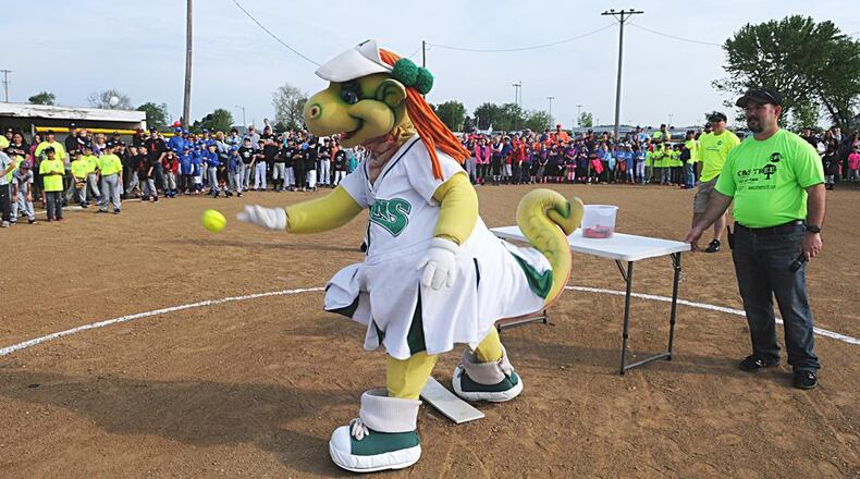 Gem, one of the mascots for the Dayton Dragon baseball team, helped kick off the softball season in New Carlisle a few years ago. Staff photo/Marshall Gorby