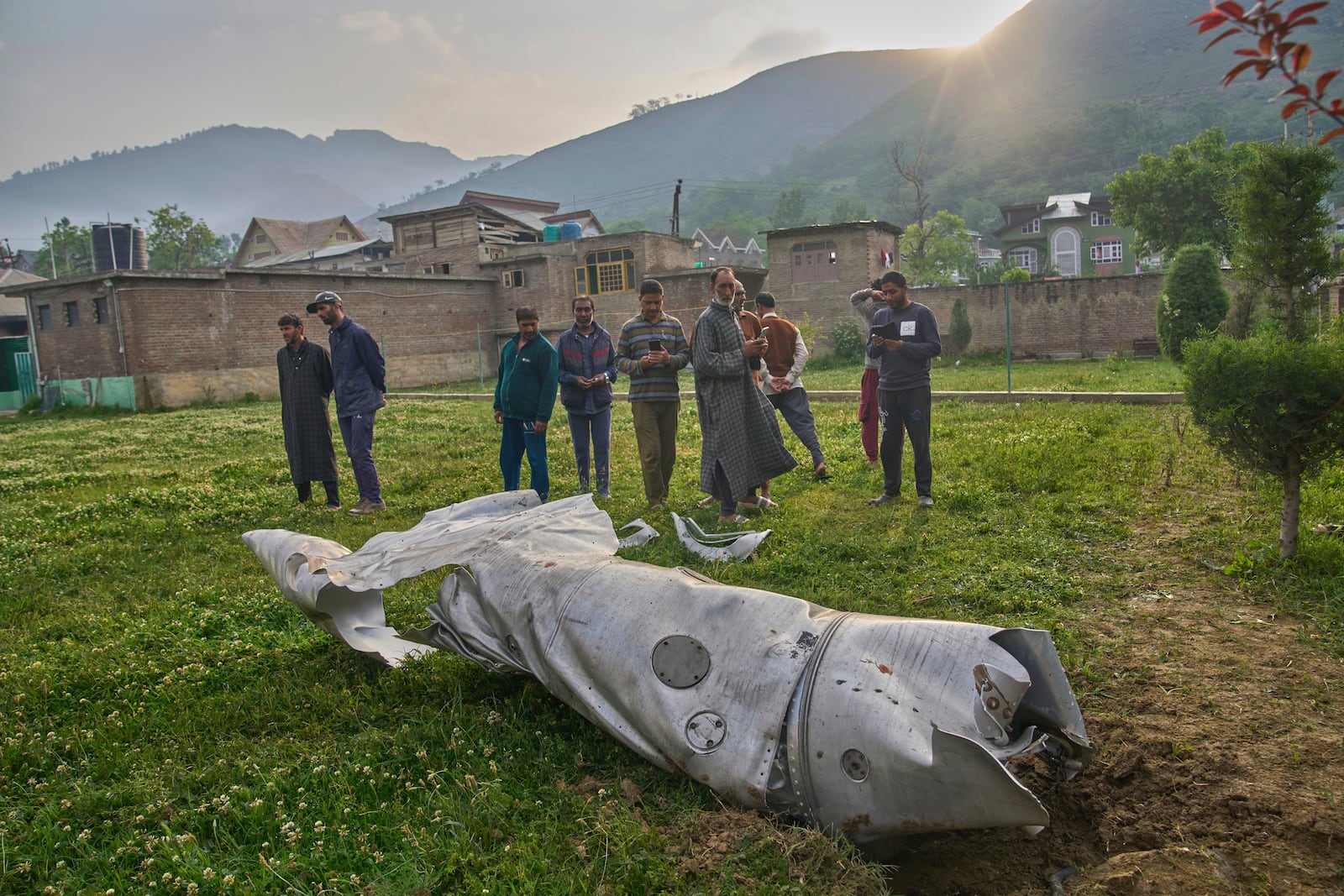 Debris of an aircraft lie at the backyard of a house at Pampore in Pulwama district of Indian controlled Kashmir, Wednesday, May 7, 2025. (AP Photo/Dar Yasin)