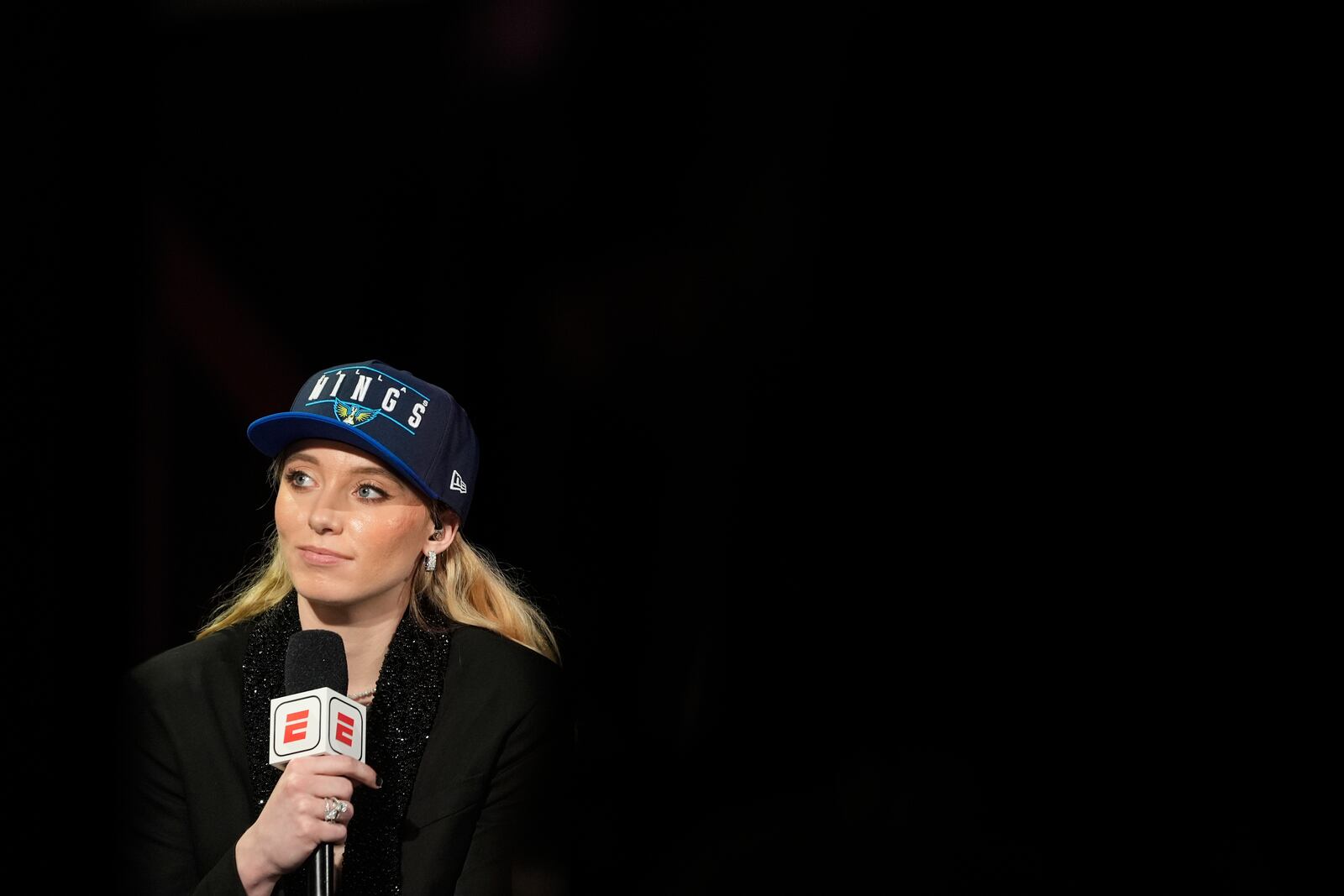 UConn's Paige Bueckers listens during an interview at the WNBA basketball draft, Monday, April 14, 2025, in New York. (AP Photo/Pamela Smith)