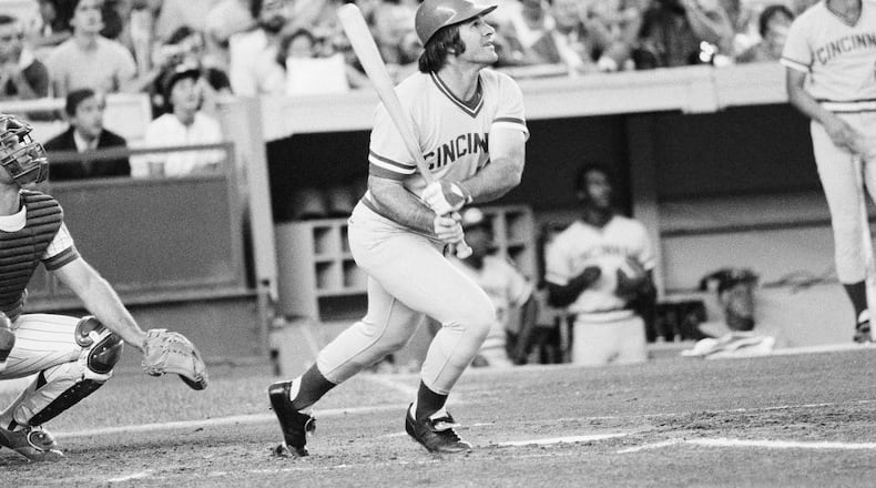 FILE - Cincinnati Reds' Pete Rose flies out in the first inning of a baseball game against the New York Mets, July 24, 1978, at New York's Shea Stadium. Rose agreed to a lifetime ban in 1989 after an investigation for Major League Baseball by lawyer John Dowd found the all-time hit leader placed bets on the Reds to win from 1985-87 while playing for and managing the team. (AP Photo/G. Paul Burnett, File)