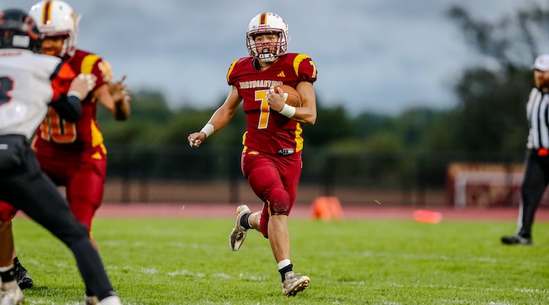 Northeastern High School junior Jackson Jones runs the ball during their game against West Liberty-Salem on Friday night at Conover Stadium. The Tigers won 24-21. Michael Cooper/CONTRIBUTED