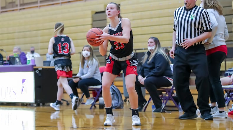 Tecumseh High School's Gabrielle Russell shoots a 3-pointer during their tournament game against Centerville at the Vandalia Butler Student Activities Center in 2021. Michael Cooper/CONTRIBUTED