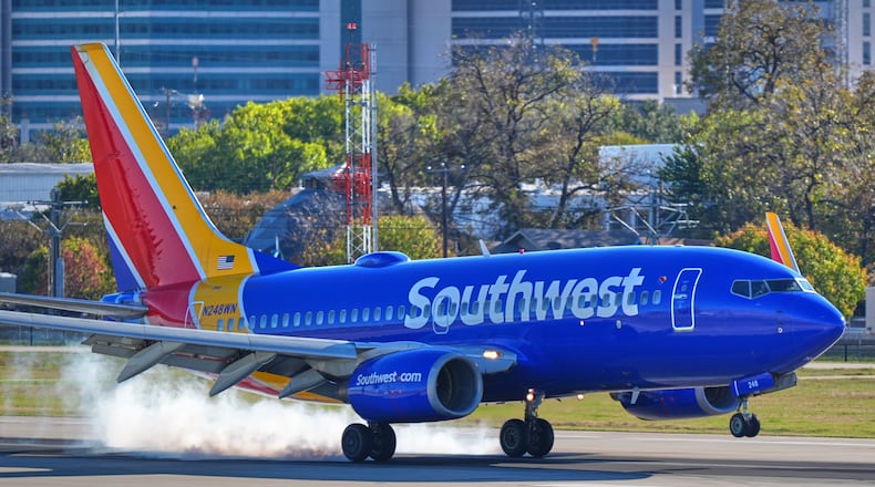 FILE - A Southwest Airlines plane lands at Love Field Airport, Nov. 26, 2025, in Dallas. (AP Photo/LM Otero, File)