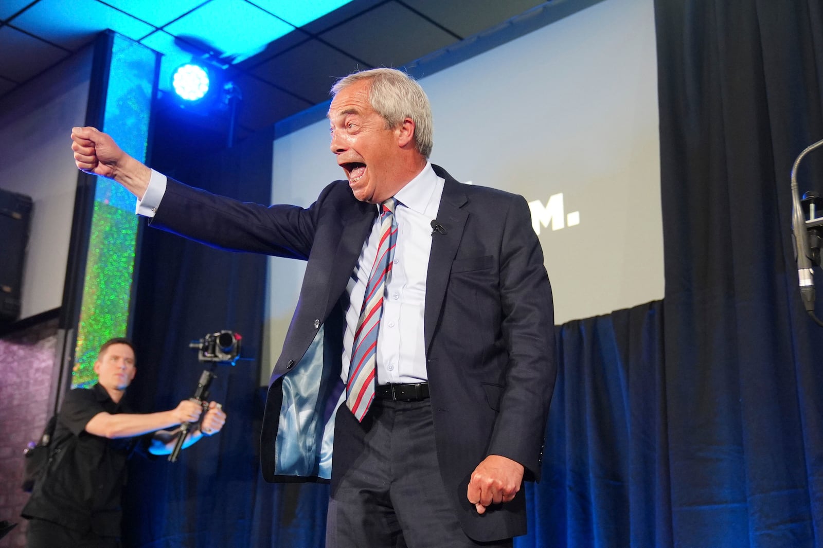 Reform UK leader Nigel Farage during a visit to The Big Club in Newton Aycliffe, England, Friday May 2, 2025. (Owen Humphreys/PA via AP)