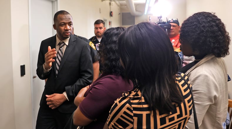 Hermanio Joseph says goodbye to his family as he's taken back to jail following jury selection Monday, April 29, 2024. BILL LACKEY/STAFF