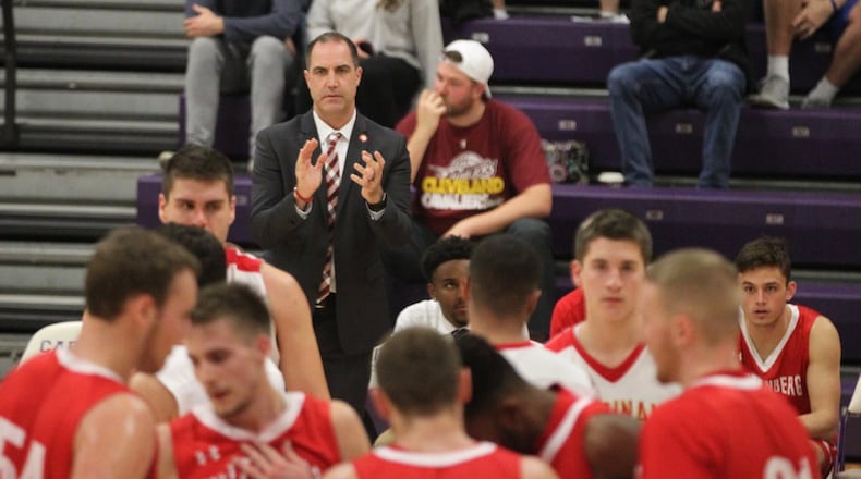 Wittenberg’s Matt Croci claps during a game against Otterbein on Nov. 25 at Capital University in Bexley. David Jablonski/Staff