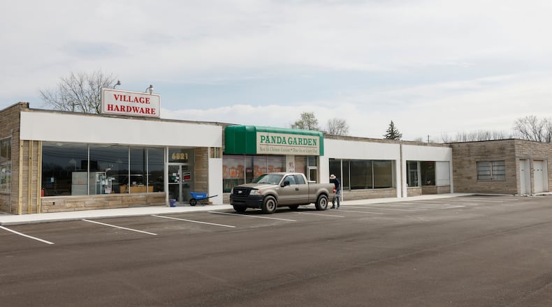 The Village Hardware and Panda Garden sit next to empty buildings on 6821-6847 Dayton-Springfield Road on Thursday, April 17, 2025. JOSEPH COOKE/STAFF