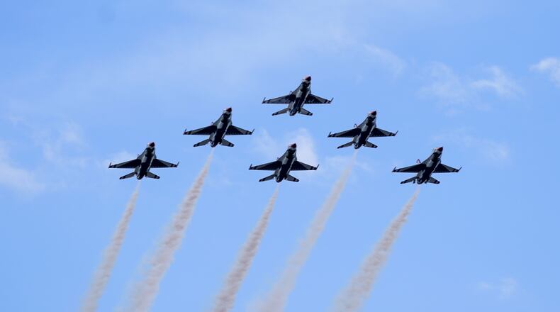 The U.S. Air Force Thunderbirds do a flyover before the NASCAR Daytona 500 auto race at Daytona International Speedway, Sunday, Feb. 14, 2021, in Daytona Beach, Fla. (AP Photo/John Raoux)