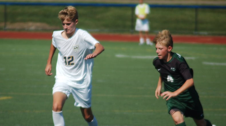 Monroe’s Ben Griffis dribbles the ball. CONTRIBUTED PHOTO BY JOHN CUMMINGS