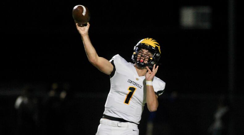 Centerville's Chase Harrison throws a pass against Springfield on Friday, Oct. 8, 2021, in Springfield. David Jablonski/Staff