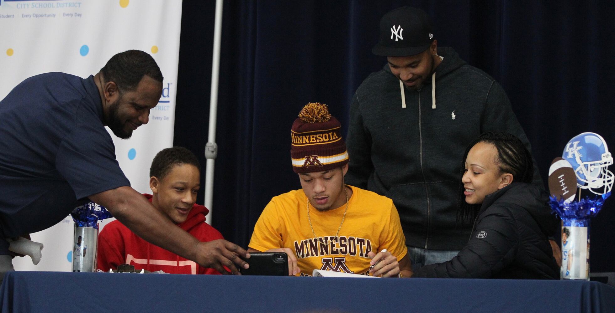 Photos: Three Springfield football players make college decisions official