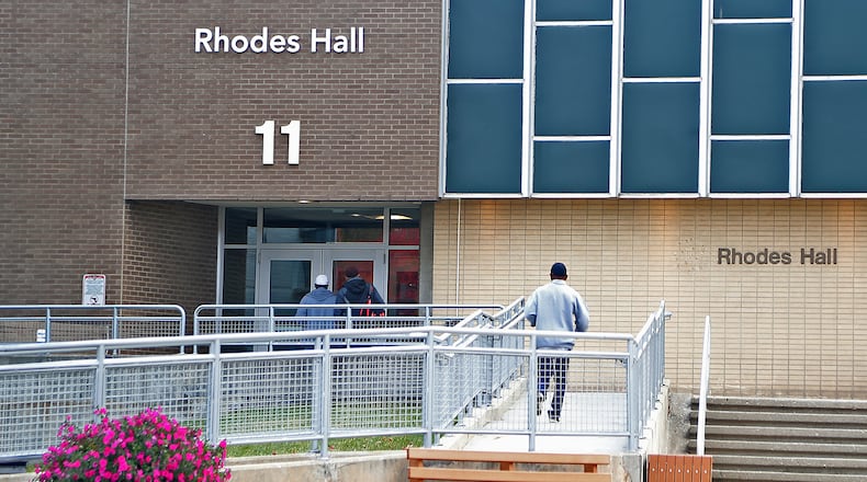 Clark State College students walk into Rhodes Hall on the Springfield campus Tuesday, Oct. 18, 2022. BILL LACKEY/STAFF