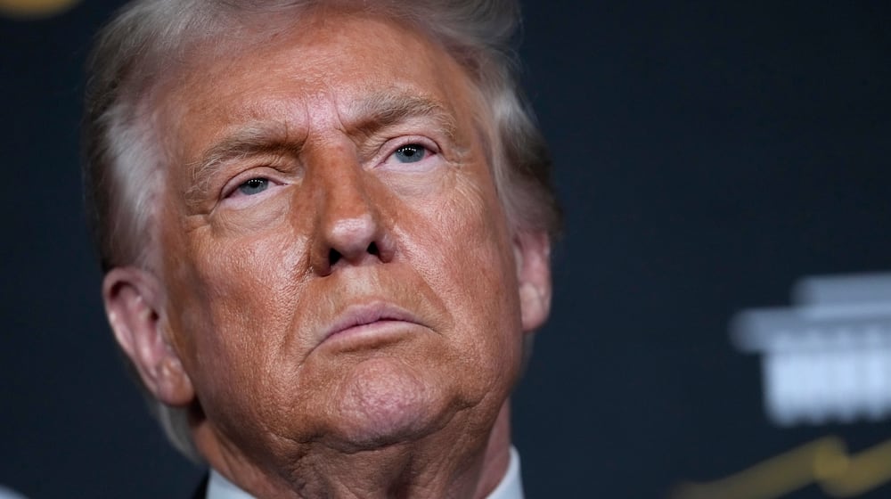 President Donald Trump walks the red carpet before the 48th Kennedy Center Honors, Sunday, Dec. 7, 2025, at the John F. Kennedy Center for the Performing Arts in Washington. (AP Photo/Julia Demaree Nikhinson)