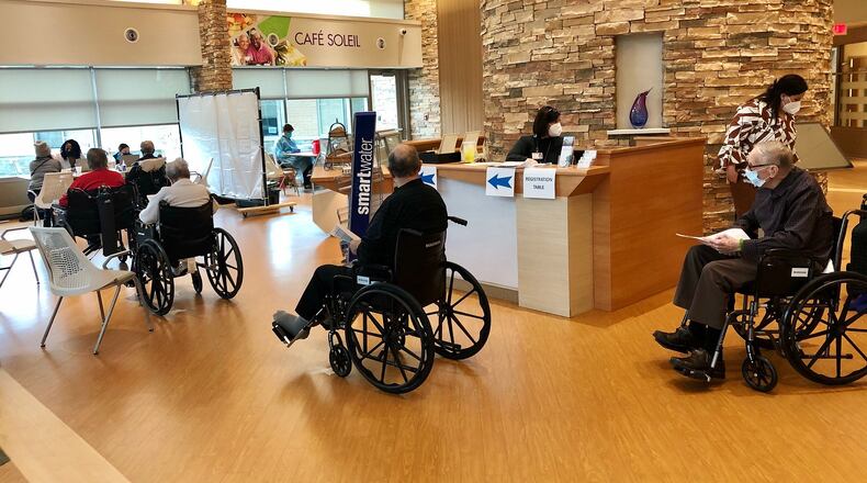 Residents at Community First Solutions' Jamestowne facility line up to receive the Pfizer COVID-19 vaccine on Monday, Dec. 21, 2020. PROVIDED