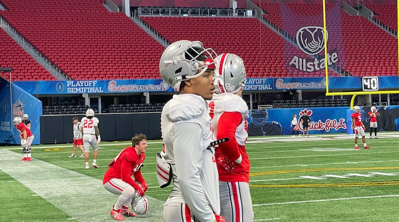 Alter grad C.J. Hicks at Ohio State's College Football Playoff semifinal practice at Mercedes Benz Stadium in Atlanta. Marcus Hartman/STAFF