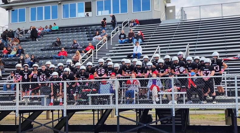 Greenon Local School District's JV football team volunteered at Our Home Assisted Living in Fairborn, and the coaches and facility organized an outing for seven of the residents to watch the final JV home game on Oct. 11. Contributed