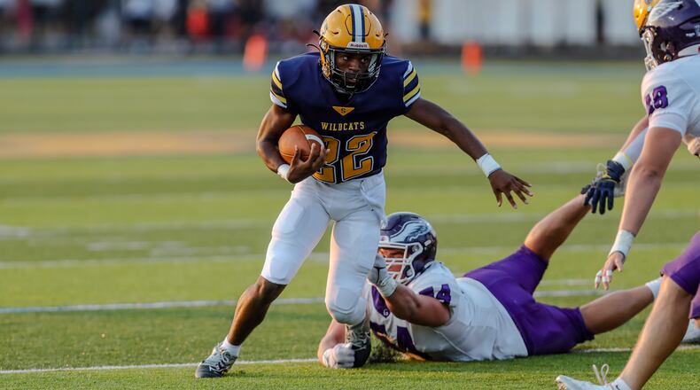 Springfield's Tre Montgomery looks for room to run against Gonzaga College High school from Washington, D.C., in Springfield on Aug. 30, 2024. The Wildcats lost 14-6. Michael Cooper/CONTRIBUTED